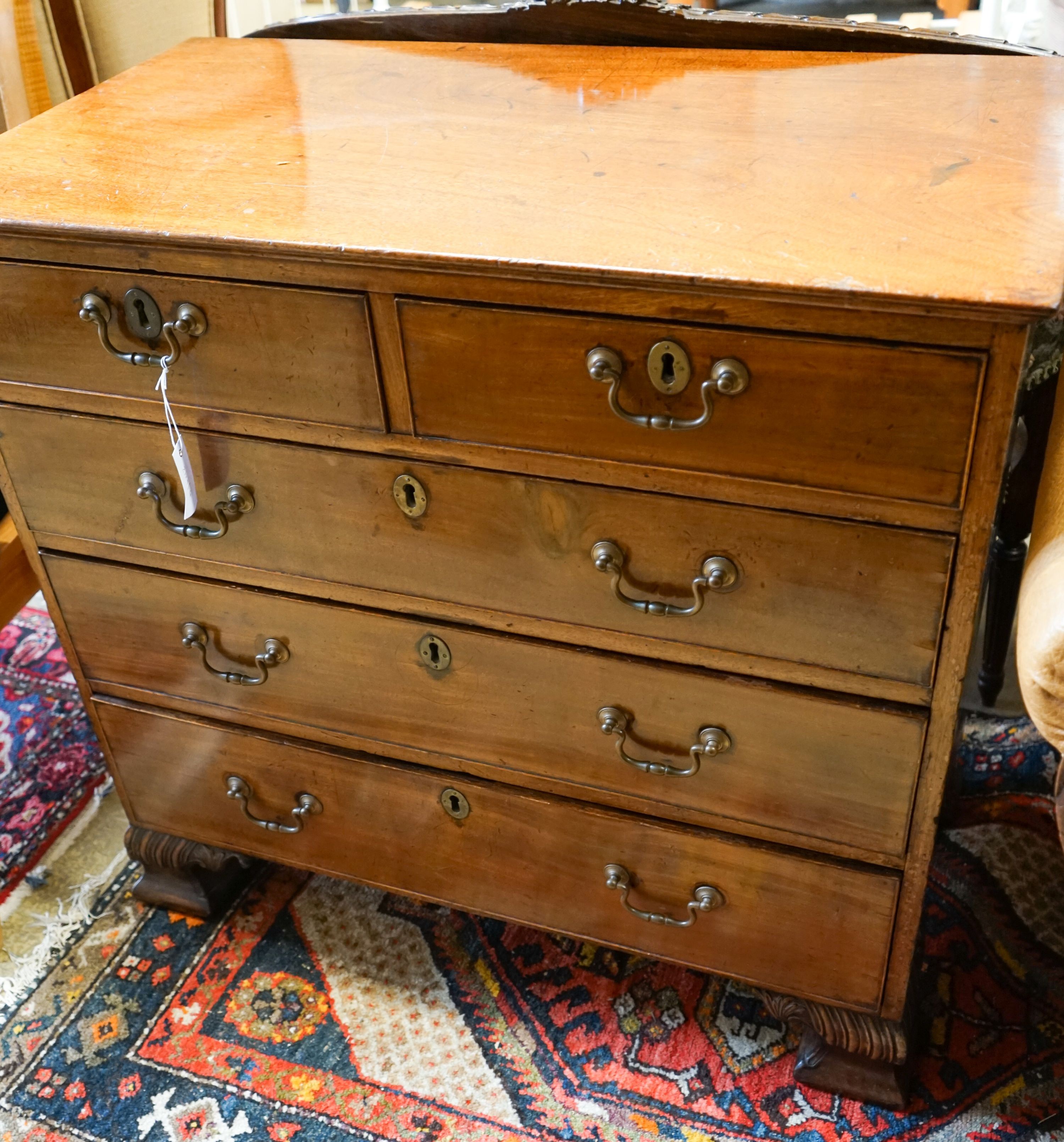 A George III mahogany chest of three long and two short drawers, on carved ogee bracket feet, width 95cm, depth 52cm, height 89cm